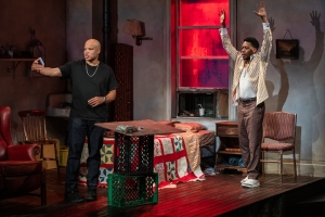 (left to right) Ensemble members Glenn Davis and Namir Smallwood in Steppenwolf Theatre Company’s revival of Topdog/Underdog.