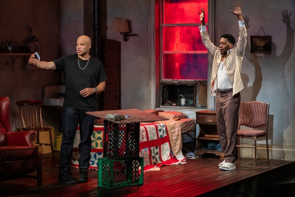 (left to right) Ensemble members Glenn Davis and Namir Smallwood in Steppenwolf Theatre Company’s revival of Topdog/Underdog.